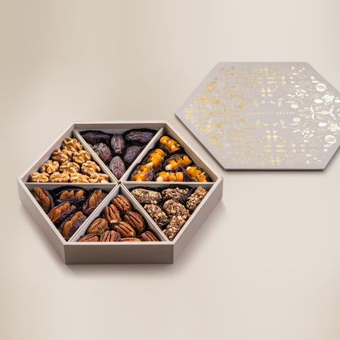 Plain Dates
Dried Mango & Cashew Stuffed Dates 
Almond Date Tamriyas
Pecan & Date Wholes
Mejdool Dates stuffed with mamra almonds
Walnut & Dried Fruit Wholes 