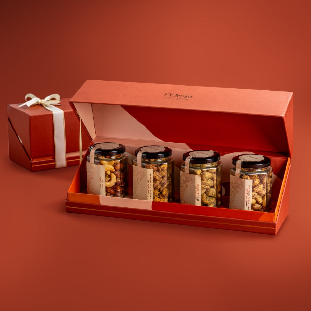 Open Bruijn festive jar box with Salted Caramel Nut Délice, Cheese & Chilli Almonds, Za’atar Cashew, and Lime & Chilli Pistachio jars.