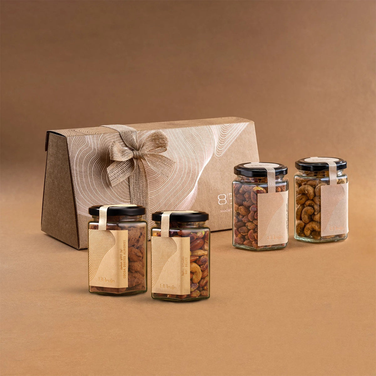 Cocoa Dusted Almonds (160g), Salted Caramel Nut Délice (170g), Lime & Chilli Pistachios Kernel (185g) and Za'atar Cashew (150g) ideal as a sizeable gift token.  