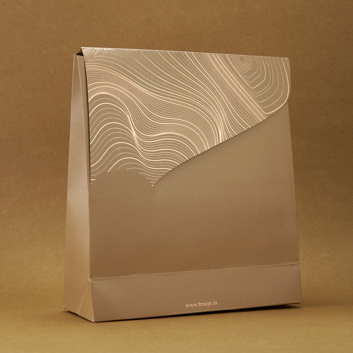 Back view of the beige sustainable gift bag with minimal design.